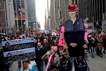 People carrying a poster of Hillary Clinton take part in the Women's March in Manhattan in New York City, New York, U.S., January 20, 2018