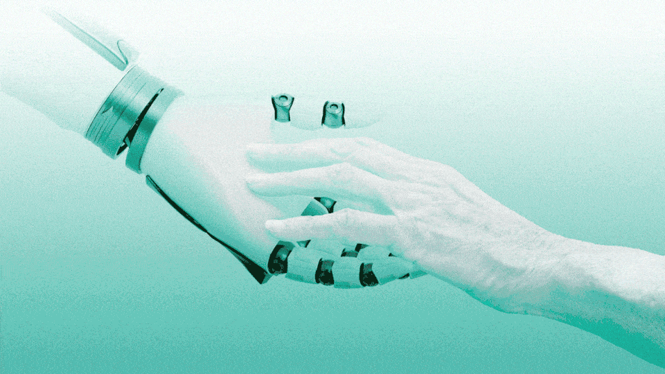 GIF of a human hand and robot hand touching. The robot hand slowly disappears.