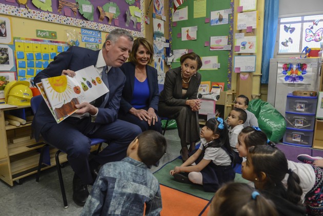 New York City Mayor Bill de Blasio (L), House Minority Leader Nancy Pelosi (D-CA) and New York Congresswoman Nydia Velazquez (R) visit a Pre-K class inside Public School 123 Suydam in Brooklyn