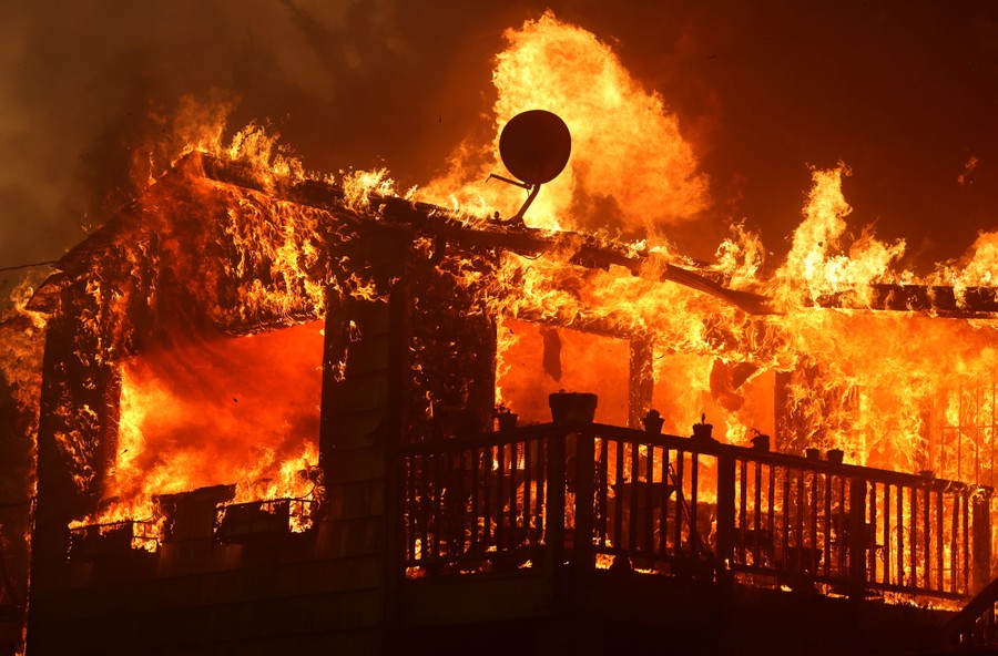 A house, entirely consumed by flames