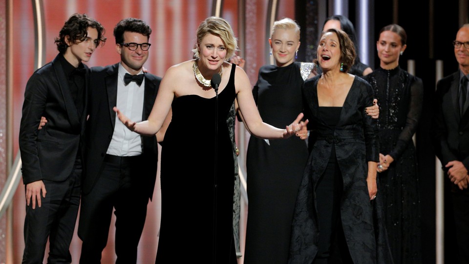 Greta Gerwig on stage with the cast of Lady Bird