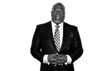 T. D. Jakes poses for a black-and-white portrait.