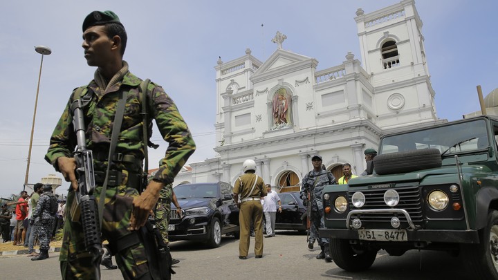 A Sri Lankan soldier secures the area outside an attack at St. Anthony's Shrine in Colombo on April 21.