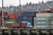 Cargo containers stacked at the Port of Seattle in April