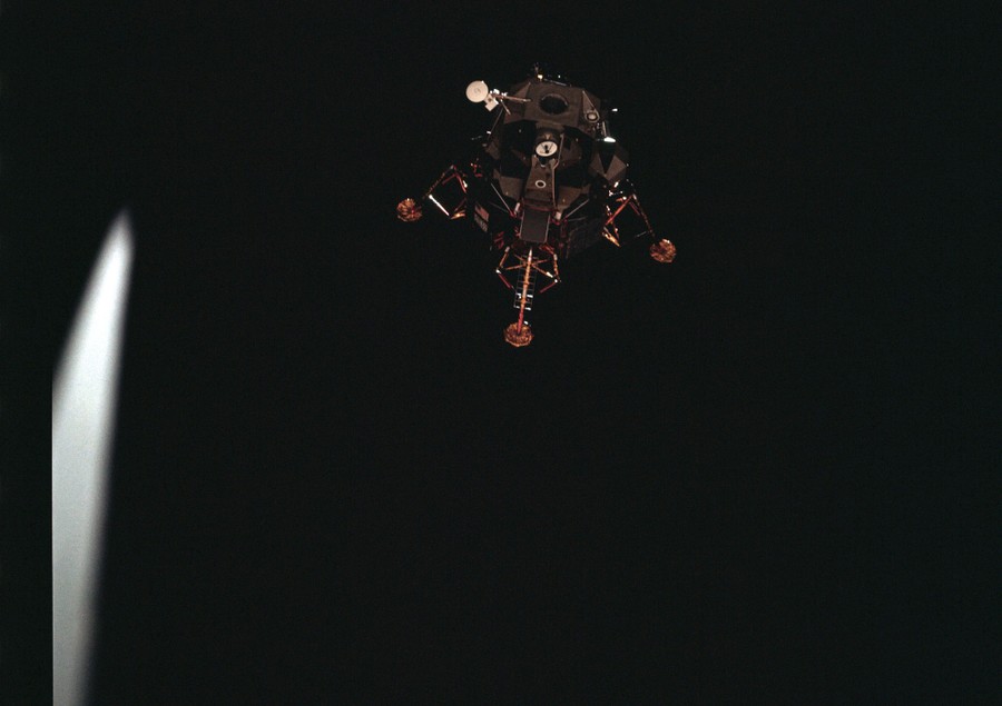 A view of a lunar lander floating nearby in space