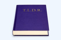 A blue book with "T.L.D.R." printed in gold on its cover in place of the title