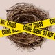 a nest with caution tape on top