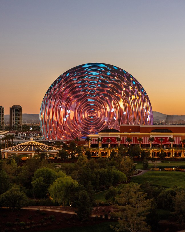 The Sphere stands against the Las Vegas skyline, its screen projecting a hypnotic rippling pattern