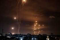 Rockets fired by Palestinian militants from Gaza City, are intercepted by the Israeli Iron Dome defence missile system on October 7, 2023.