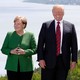 Theresa May, Angela Merkel, Donald Trump, and Justin Trudeau pose during a family photo at the G7 summit in the Charlevoix city of La Malbaie