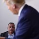 Former New Jersey Governor Chris Christie and former New York City Mayor Rudy Giuliani listen while President Donald Trump speaks during a briefing at the White House on September 27.