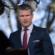 Photo of Pete Hegseth under stage lights
