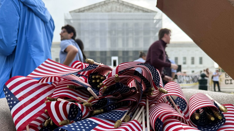 Photo of American flags in front of the Supreme Court