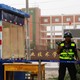 A guard stands outside what is officially known as a "vocational skills education center" in Hotan in Xinjiang in September 2018.