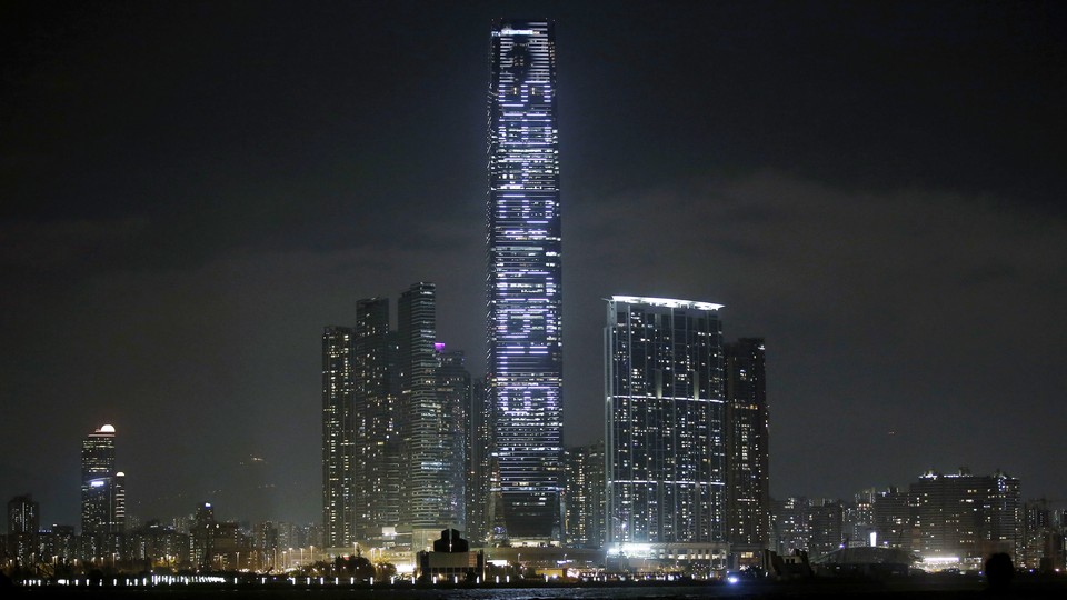 A photo of the art installation "Countdown Machine." A countdown to the year 2047 is projected onto the facade of Hong Kong's tallest skyscraper.