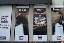 A political display is posted on the outside of the Fox News headquarters in New York in July 2020.