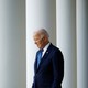 Biden walking through white columns