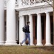 a student walks on campus