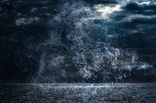 a manipulated image with scratches and dust shows the ocean