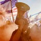 A photo of a man with a bullhorn at a protest of the Israeli government's judicial-overhaul bill