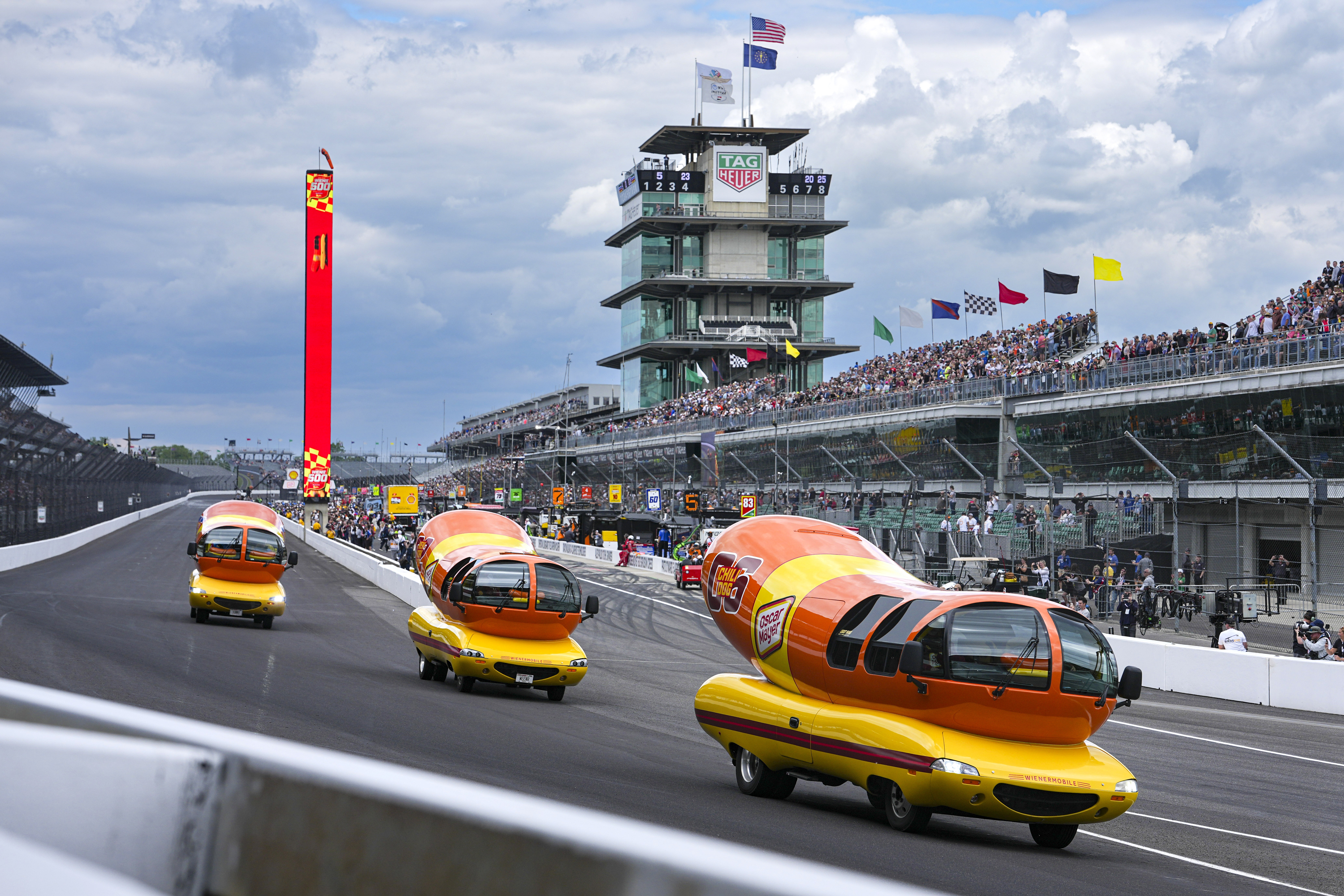 Three Wienermobiles were seen driving along the track.