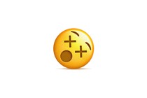 The "face with crossed-out eyes" emoji, turned to a slight right angle