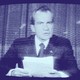 Nixon announces his resignation on national television, following the Watergate scandal.