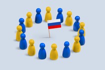 Blue and yellow pawns surrounding a Russian flag