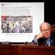 Senators Dianne Feinstein and Pat Leahy sit in front of a screen showing a fake Facebook page created by Russia during the 2016 election.