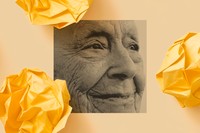 A black-and-white photo of an elderly person with a wrinkled face smiling and looking into the distance