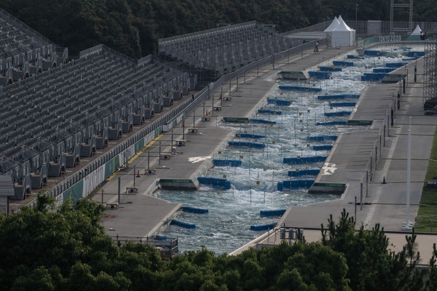 An overview of a canoe slalom course and seating area for spectators.
