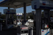 Chevron gas pumps in the late afternoon