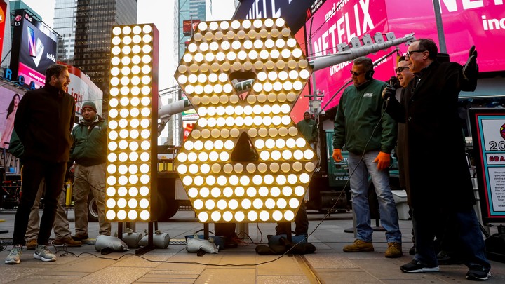 The "18" Numerals are turned on after being delivered to be placed atop 1 Times Square for the New Year's Eve ball drop.