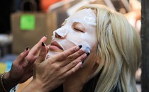 A model wears a face mask