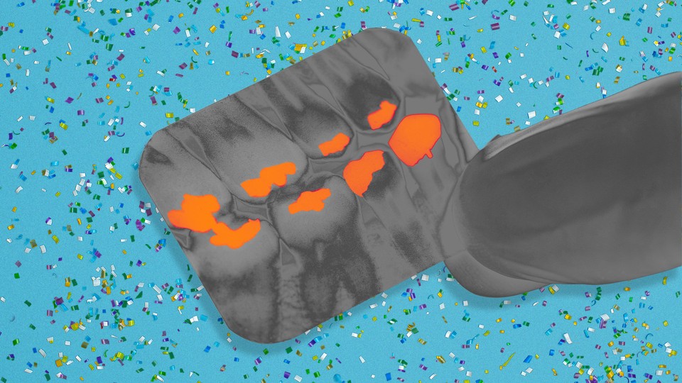 Graphic illustration of a dental X-ray in which the teeth have spots glowing bright orange against a blue background speckled with tiny, multicolor plastic beads