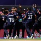 A photo of Team U.S.A. celebrating during a game in the T20 Cricket World Cup.