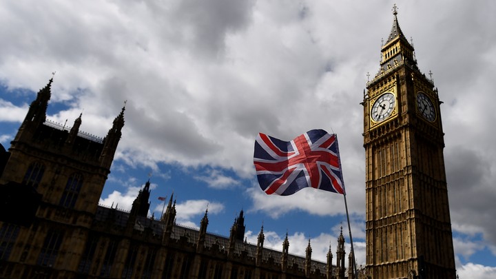 The Union Flag flies near the Houses of Parliament in London