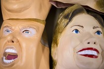 Rubber masks in the likeness of Donald Trump and Hillary Clinton are stacked at a factory in Saitama, Japan.