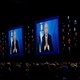 Speaking via satellite feed from Israel, Israeli Prime Minister Benjamin Netanyahu addresses AIPAC on March 26.