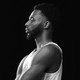 A black-and-white photo of Andrew Wiggins in profile