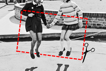 A dotted-line rectangle representing a label, with an image of scissors snipping it, overlays a black and white image of two young girls holding hands and jumping in the air