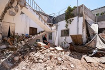 A Palestinian man checks the destruction following an Israeli raid on Jenin, in the occupied West Bank, on August 6, 2024.