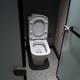 A photo of a toilet with the lid up