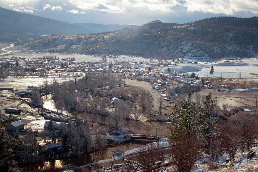 An aerial view of a partially-flooded valley.