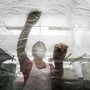 A woman at work in a Chinese textile factory