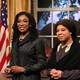 Four Black people stand smiling in a replica of the oval office. From left: a man wearing a judge's robe and glasses, a man dressed in a Dodgers baseball uniform, a woman with glasses wearing a black suit, and a woman wearing a dress with a lace collar and a shawl