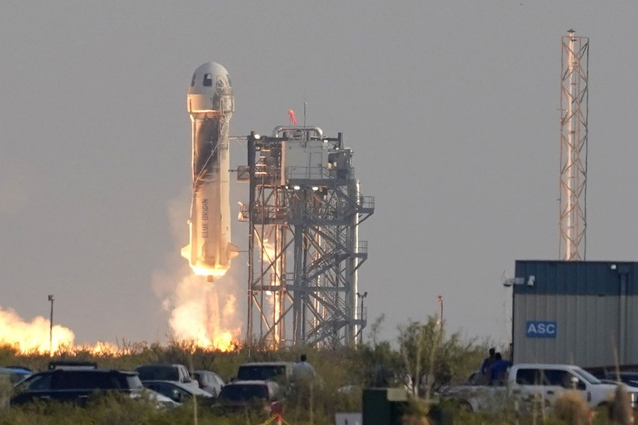 A small rocket lifts off from a Texas field.