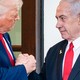 A picture of Netanyahu and Trump shaking hands.