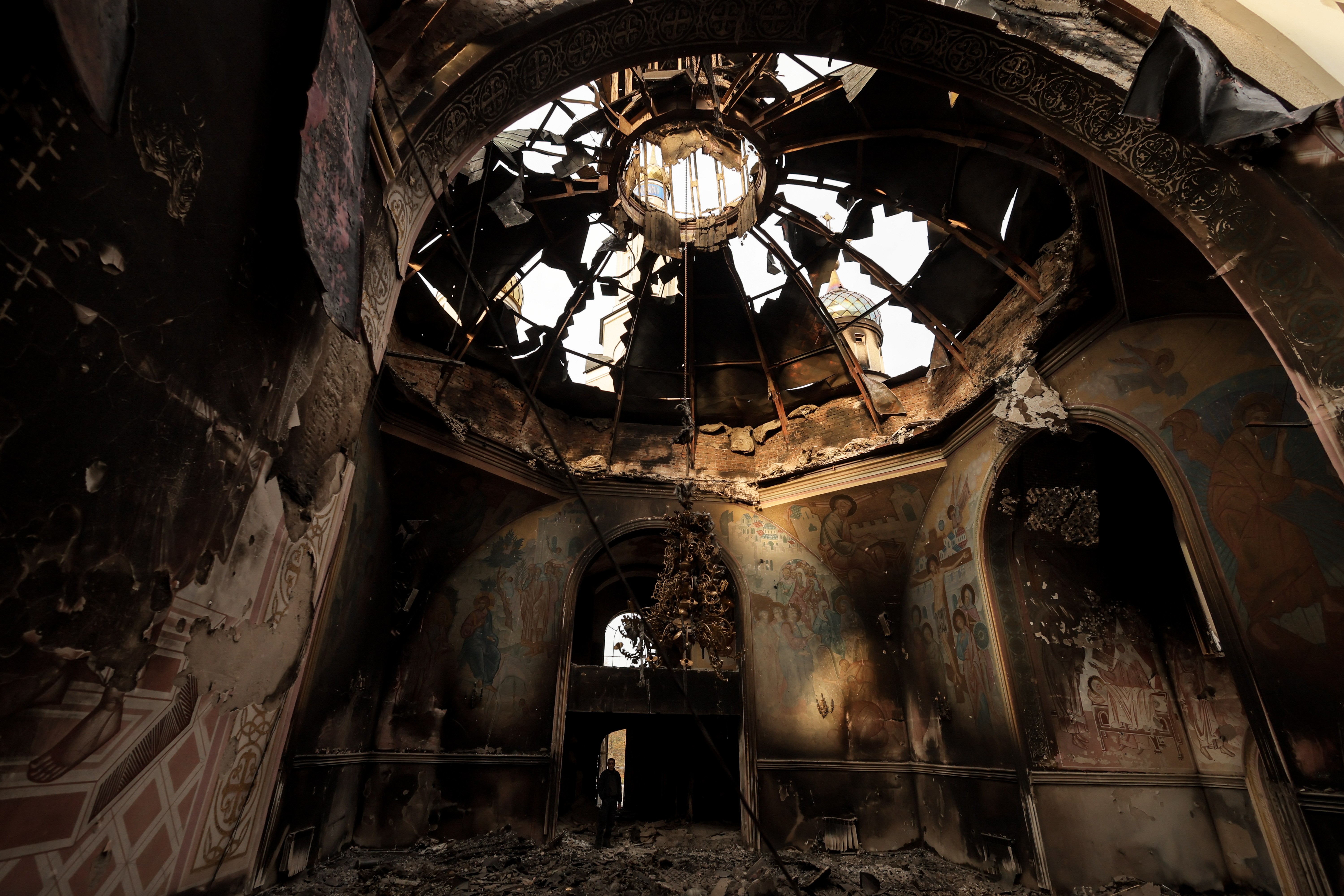 The heavily-damaged interior of a church