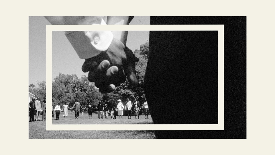 Image of two people holding hands